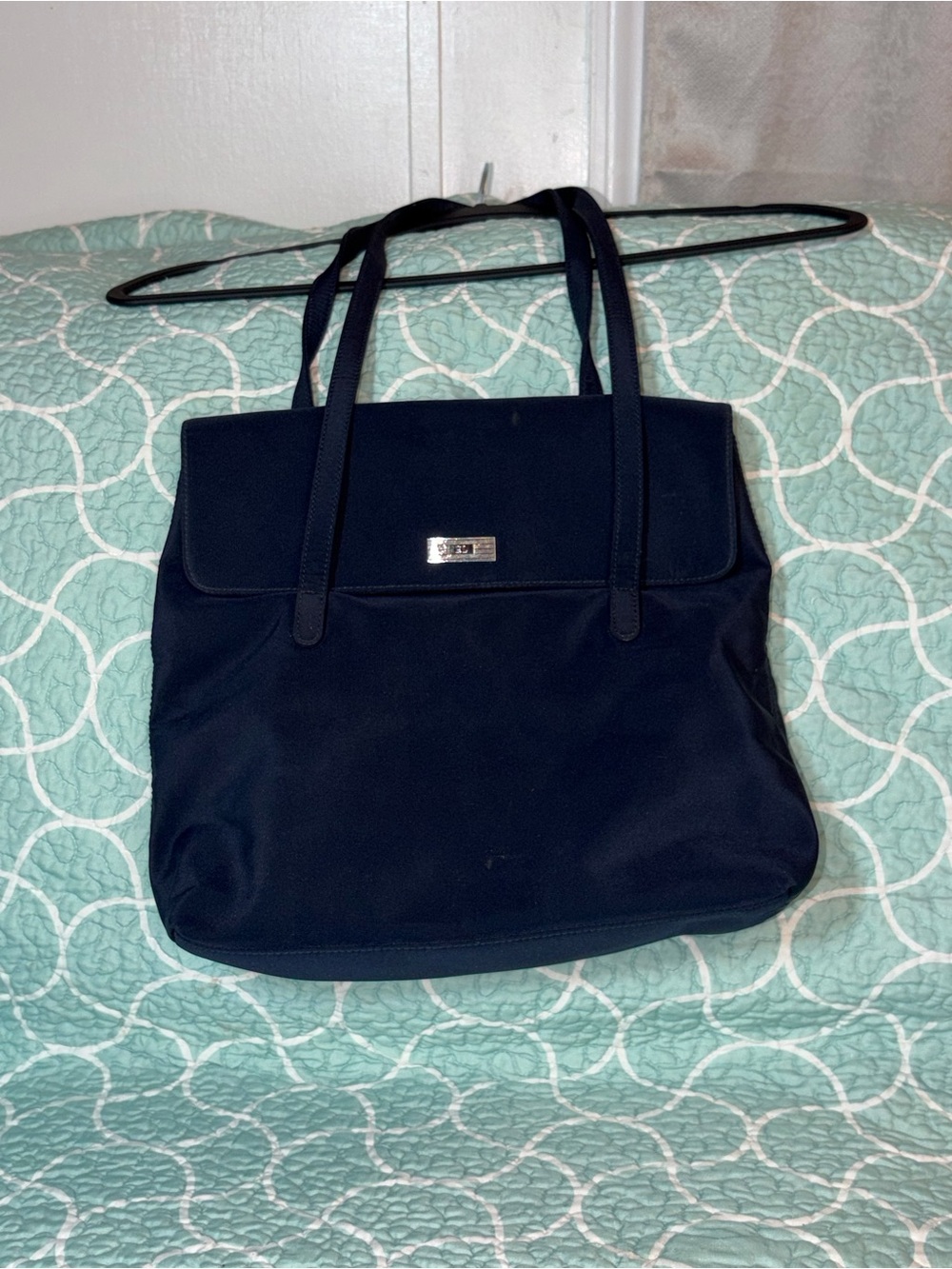Classic Navy Shoulder Bag with Flap and Metal Accent
